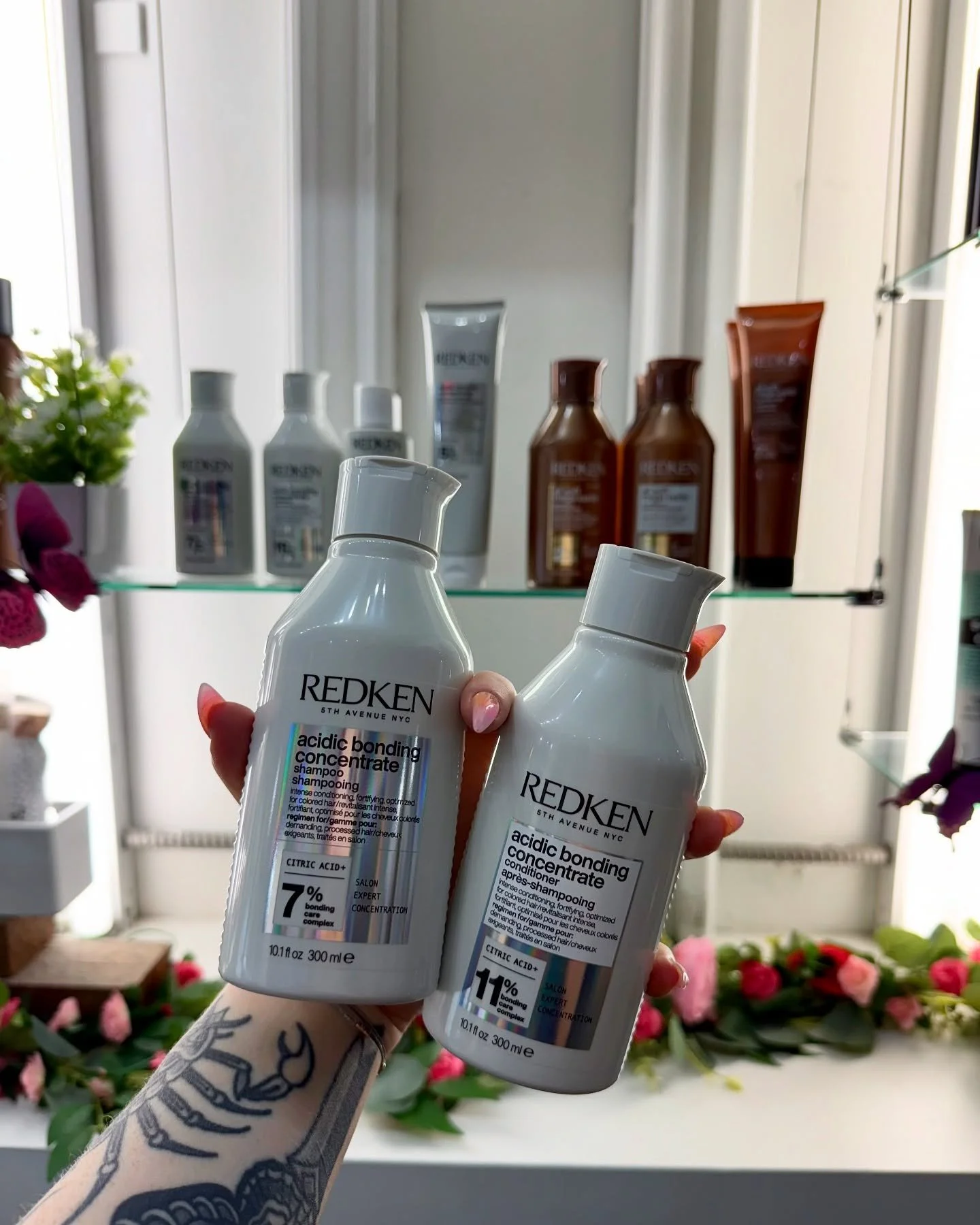 Redken hair care products inside PaperDoll Salon